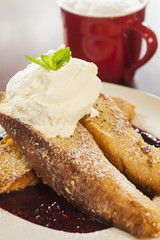 vanilla-dipped French toast, whipped cream and syrup with coffee