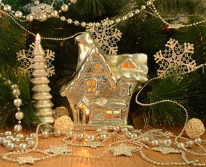 Christmas house on conifer background