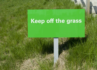 keep off the grass sign