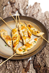Spicy grilled chicken meat on skewer