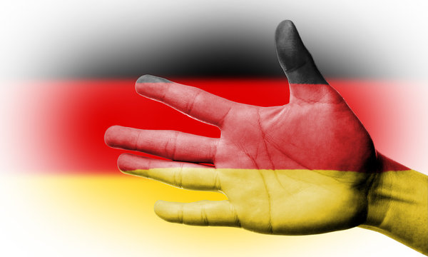 Cheering fan with Painting national Germany flag