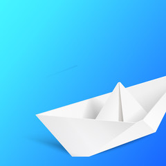 Fototapeta na wymiar Origami ship over blue.