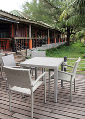 Fototapeta na wymiar Outdoor restaurant with tables and chairs in resort