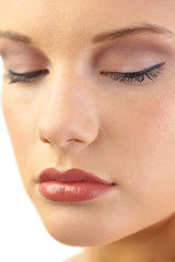 Naklejka premium Close up on gorgeous blonde models closed eyes