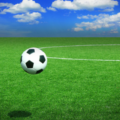 Fototapeta na wymiar Soccer football field stadium grass line ball background