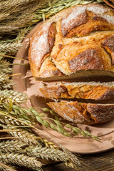 Closeup of fresh sliced ​​bread and ears of corn