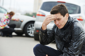 upset man after car crash