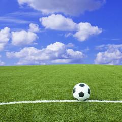 Fototapeta premium Soccer football field stadium grass line ball background