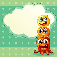 Three monsters playing in front of an empty cloud template