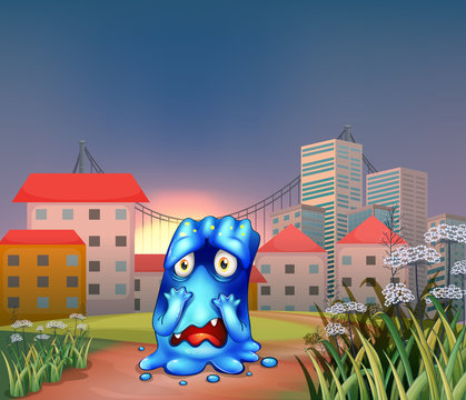 A scared monster near the tall buildings