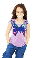 Fototapeta premium Pretty girl with hands in pockets on white background