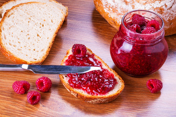 Rapsberry jam with slice of bread