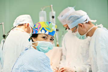 surgeons team at operation