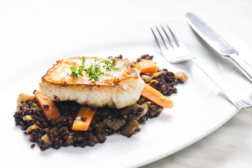 pikeperch fillet with lentils and carrot