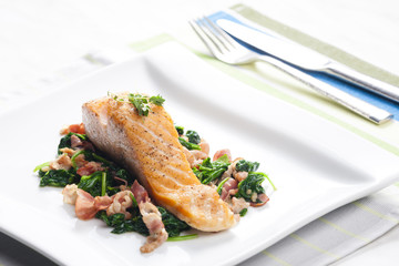 salmon fillet with warm spinach and bacon salad