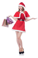 Young woman in red santa costume on white
