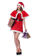 Young woman in red santa costume on white
