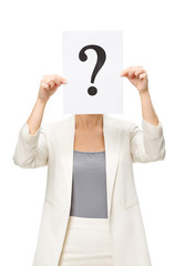Half-length portrait of businesswoman handing question mark