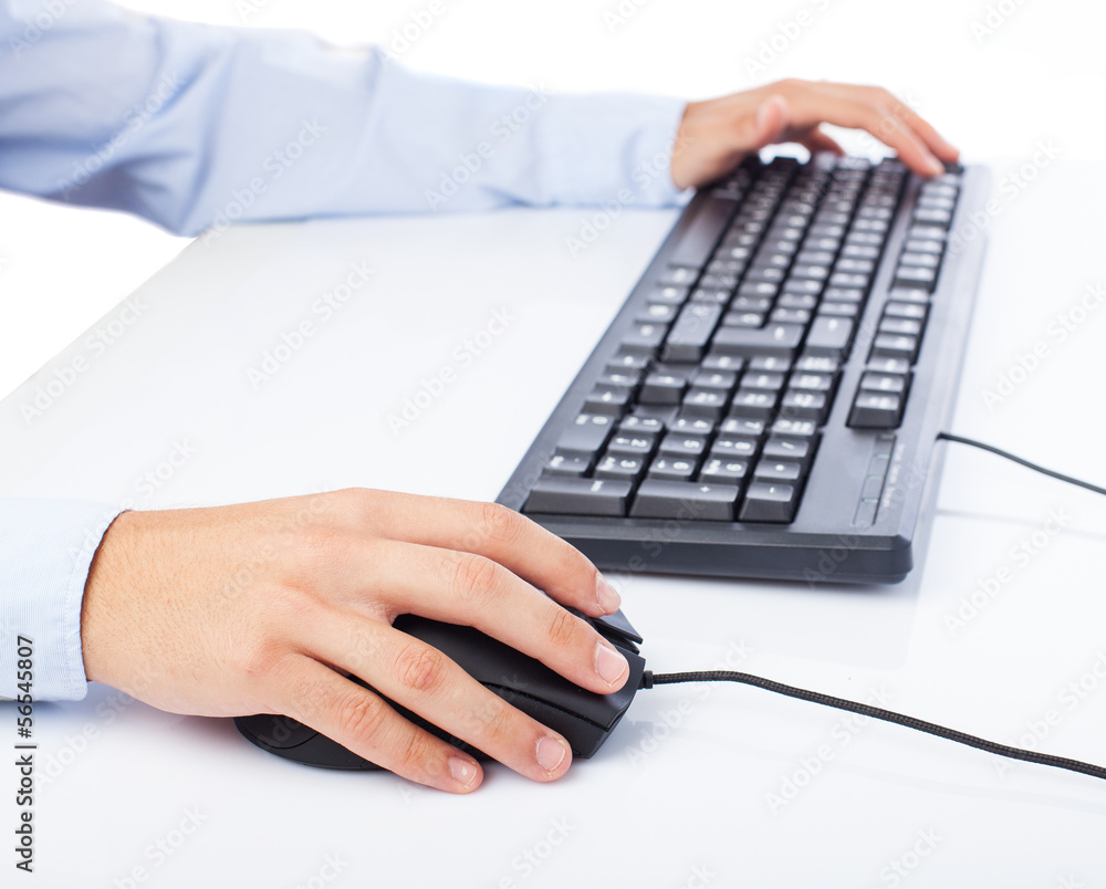 Wall mural businessman using computer on a white background