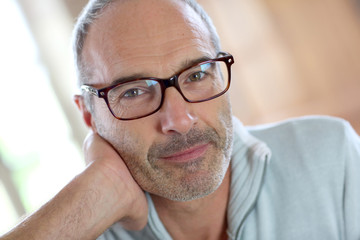 50-year-old attractive man with eyeglasses