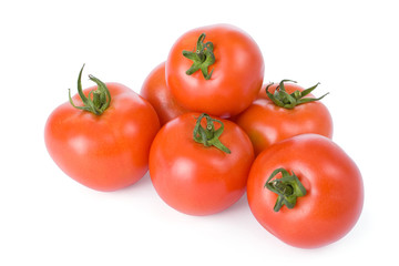 Ripe tomatoes isolated on a white background.