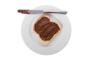 slice of bread covered with Hazelnut and chocolate spread