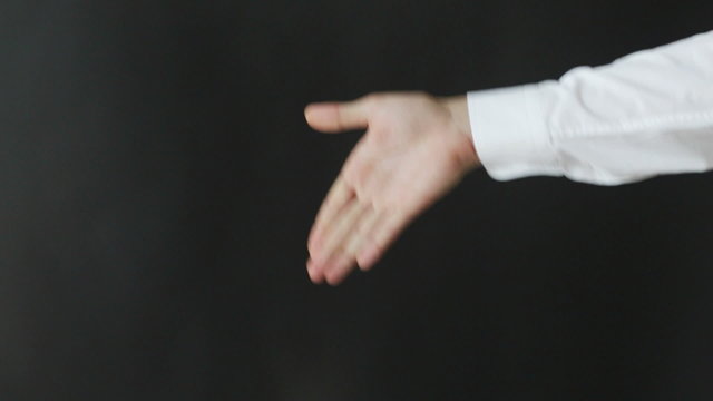 man showing trick with playing cards