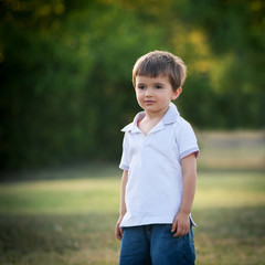 Little boy outdoors portrait.