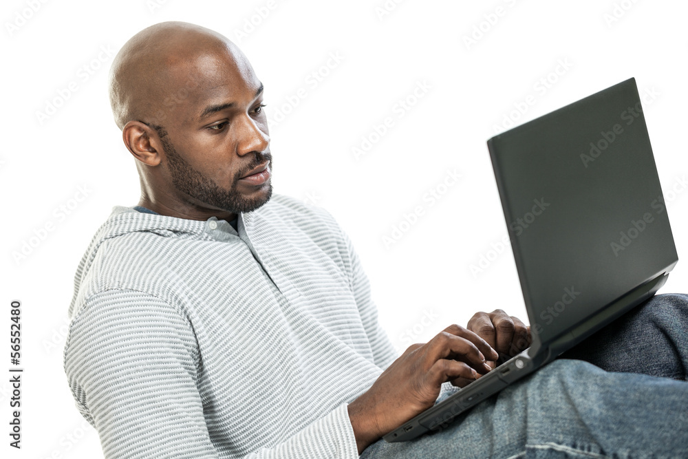 Sticker handsome black man typing on a laptop