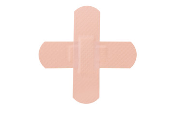 Obraz premium Two crossed adhesive bandages isolated on white