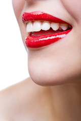 Fototapeta premium Close up of female red lips, isolated