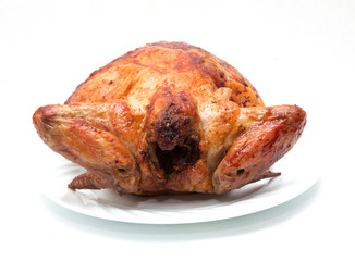 grilled chicken on a plate on a white background