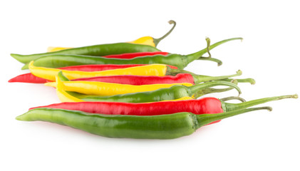 colorful chili peppers isolated on white background