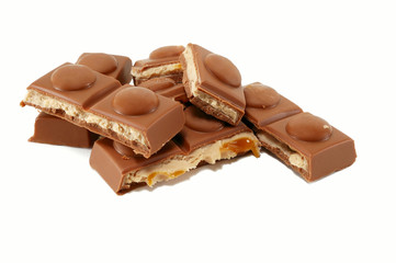the broken pieces of chocolate with caramel