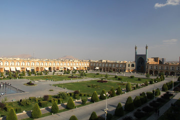 View of mosque and garden against blue sky