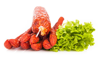 smoked sausages isolated on white