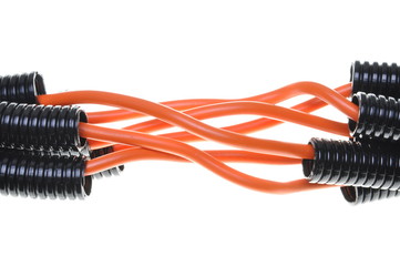 Corrugated pipe with cables isolated on white background