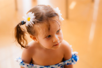 Portrait of beautiful blond little girl