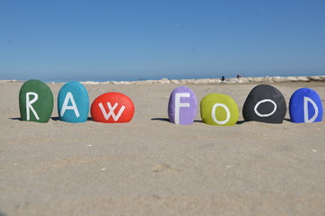 Raw food concept on colourful stones