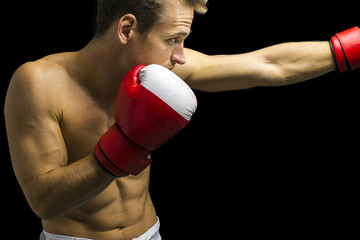 Fototapeta na wymiar Boxer punching