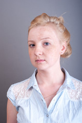 Studio portrait of freckled blonde