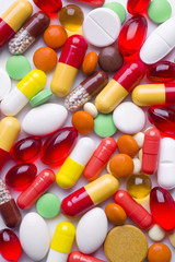 Colorful tablets and pills background