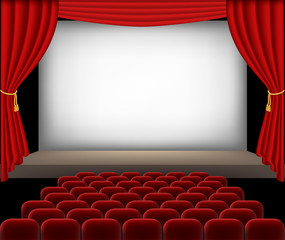 Cinema auditorium with red seats and curtains