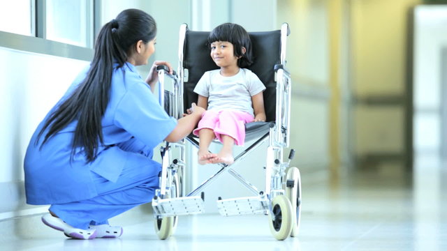 Little Asian Indian Girl Wheelchair Hospital Corridor