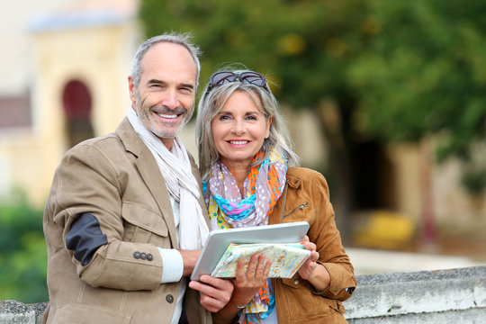 Senior Couple Of Tourists On A Trip