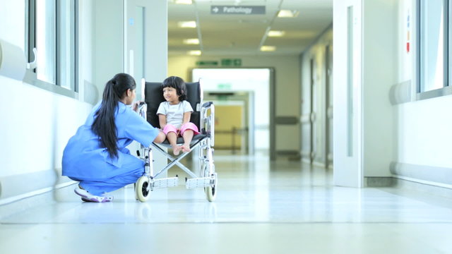 Little Asian Indian Girl Wheelchair Hospital Corridor
