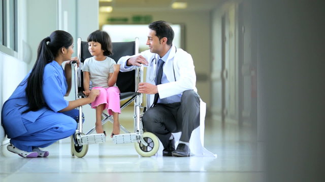Asian Indian Nurse Paediatrician Little Ethnic Girl Hospital Wheelchair