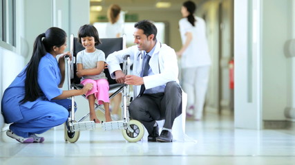 Ethnic Female Child Comforted Asian Indian Nurse Doctor Before Treatment - Powered by Adobe