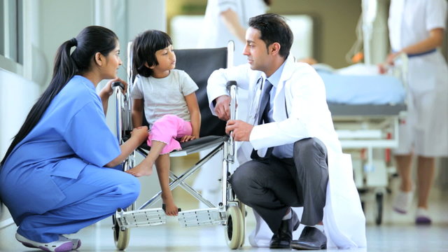 Asian Indian Nurse Paediatrician Little Ethnic Girl Hospital Wheelchair