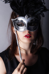 beautiful young girl with venetian mask